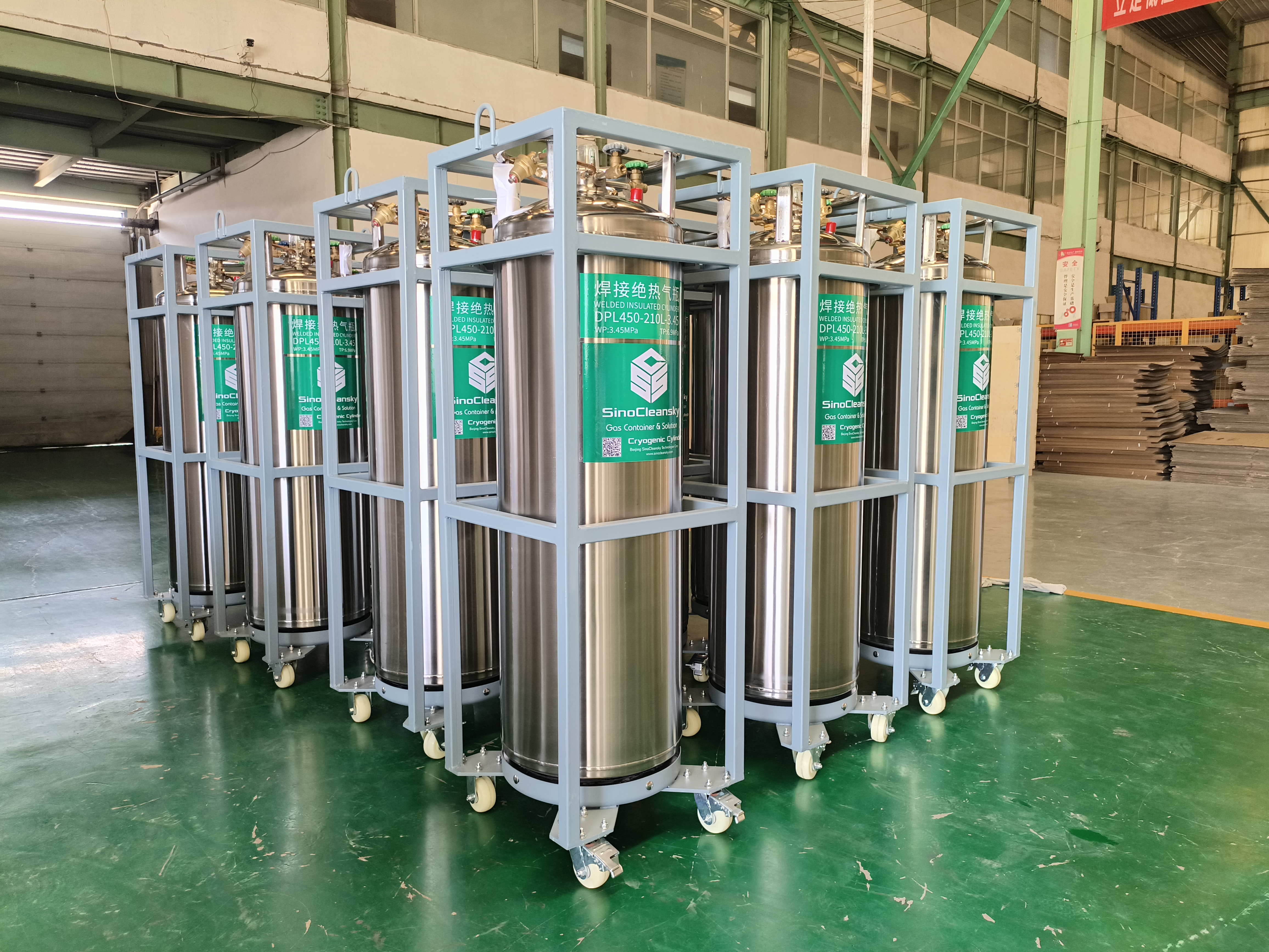 LNG production facility with liquefaction plant and storage cylinders